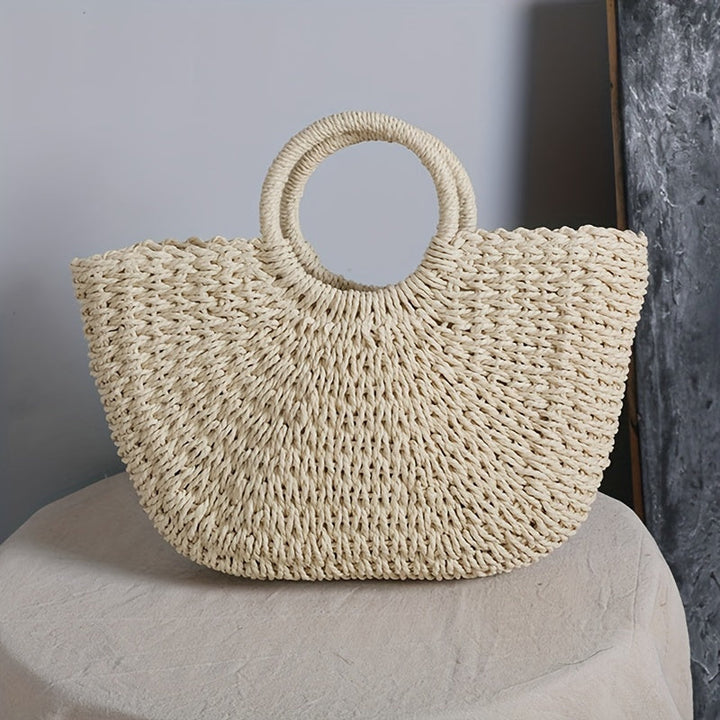 Ottavia – Halbmond-Tasche aus geflochtenem Stroh – Naturbeige