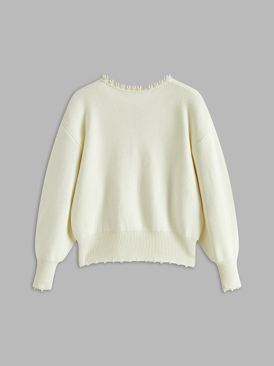 Strickjacke mit Perlenbesatz