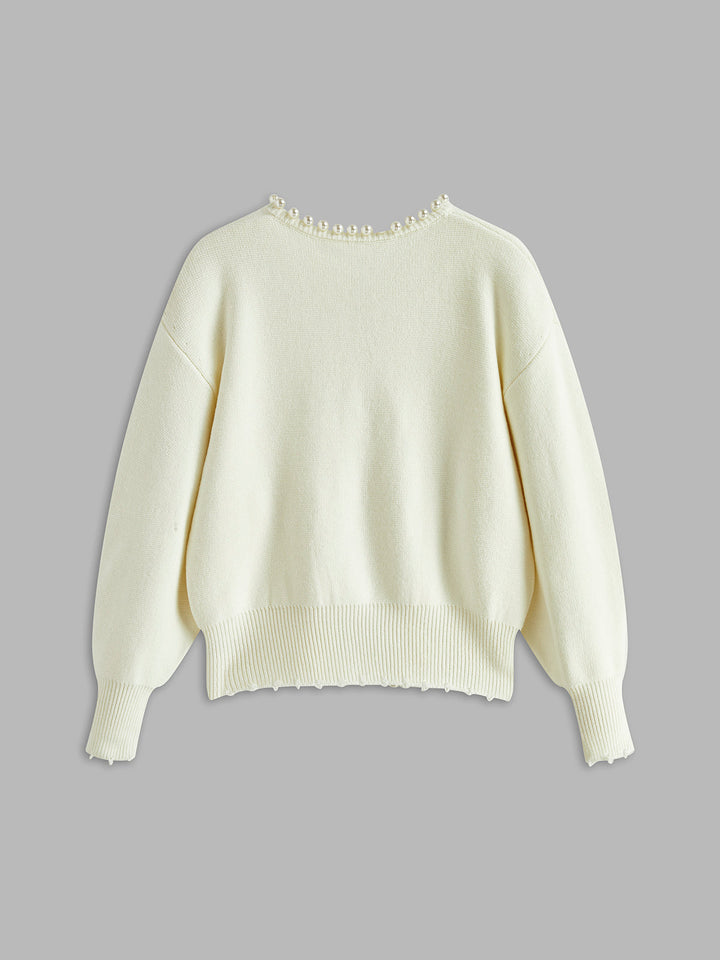 Strickjacke mit Perlenbesatz