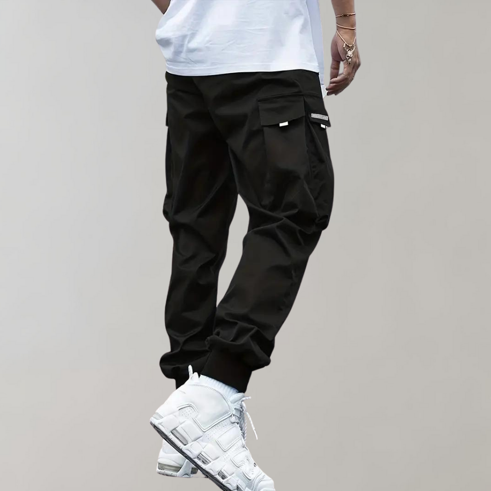 Nael Berlin | Herren Cargo Jogginghose – Lila Streetwear-Hose mit Reißverschlusstaschen & Bündchen