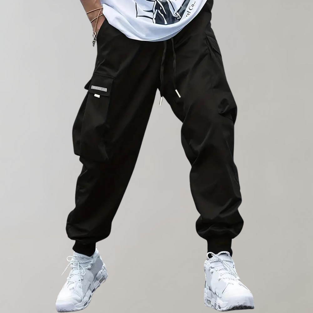 Nael Berlin | Herren Cargo Jogginghose – Lila Streetwear-Hose mit Reißverschlusstaschen & Bündchen