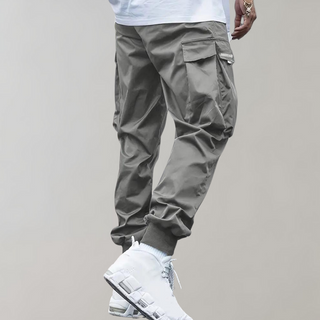 Nael Berlin | Herren Cargo Jogginghose – Lila Streetwear-Hose mit Reißverschlusstaschen & Bündchen