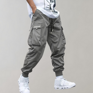 Nael Berlin | Herren Cargo Jogginghose – Lila Streetwear-Hose mit Reißverschlusstaschen & Bündchen