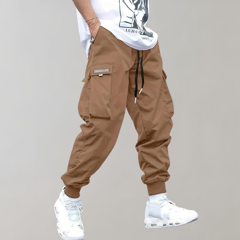 Nael Berlin | Herren Cargo Jogginghose – Lila Streetwear-Hose mit Reißverschlusstaschen & Bündchen