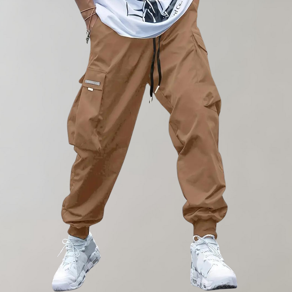 Nael Berlin | Herren Cargo Jogginghose – Lila Streetwear-Hose mit Reißverschlusstaschen & Bündchen