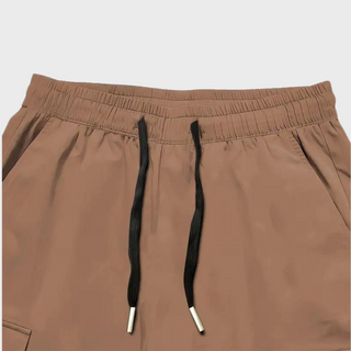 Nael Berlin | Herren Cargo Jogginghose – Lila Streetwear-Hose mit Reißverschlusstaschen & Bündchen