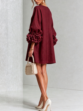 Blumen-Minikleid mit Knopfleiste und auffälligen Blüten-Manschetten