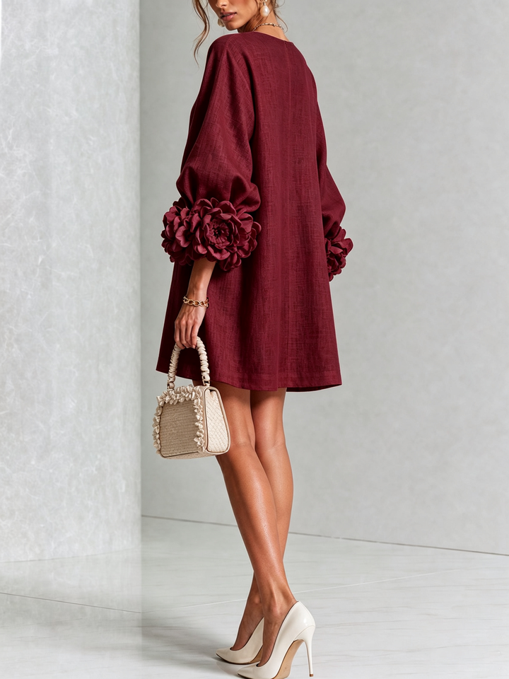 Blumen-Minikleid mit Knopfleiste und auffälligen Blüten-Manschetten