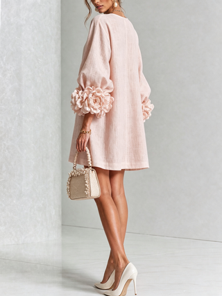 Blumen-Minikleid mit Knopfleiste und auffälligen Blüten-Manschetten